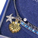 Brilliance Two-Tone Silver Plated Enjoy The Journey Genuine Crystal Bar Starfish & Seashell Charm Adjustable Bracelet