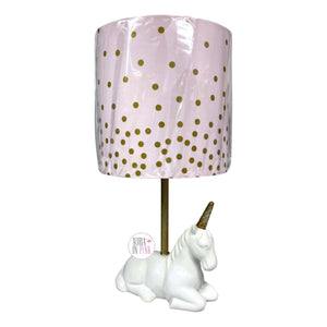 <transcy>Lampada unicorno in ceramica Cooper Ridge con paralume rosa a pois oro sfumato</transcy>