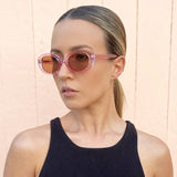 Reality Eyewear Transparent Pink Tinted Shaken Not Stirred Ladies Sunglasses - Aura In Pink Inc.